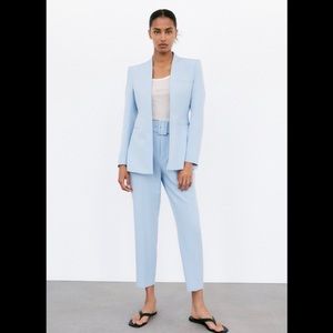 Zara High Waisted Belted Pants in light blue color.
